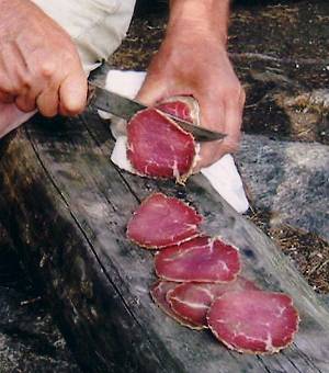 Here's Bill cutting up some beef jerky.